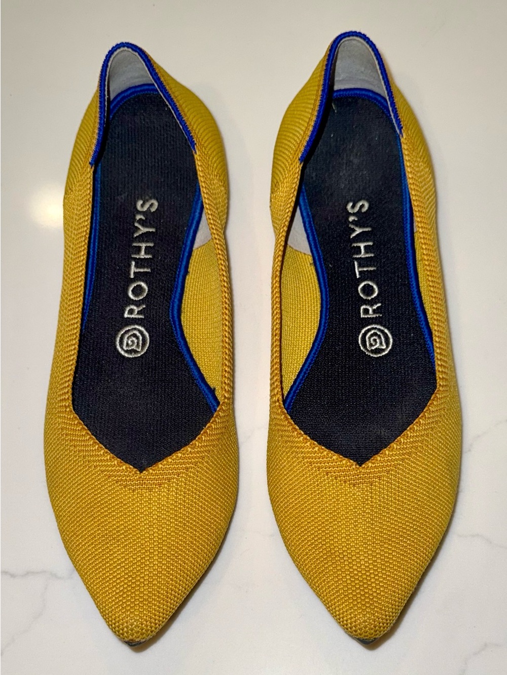 Rothy’s “The Point” Pointed Toe Flats in Marigold Yellow